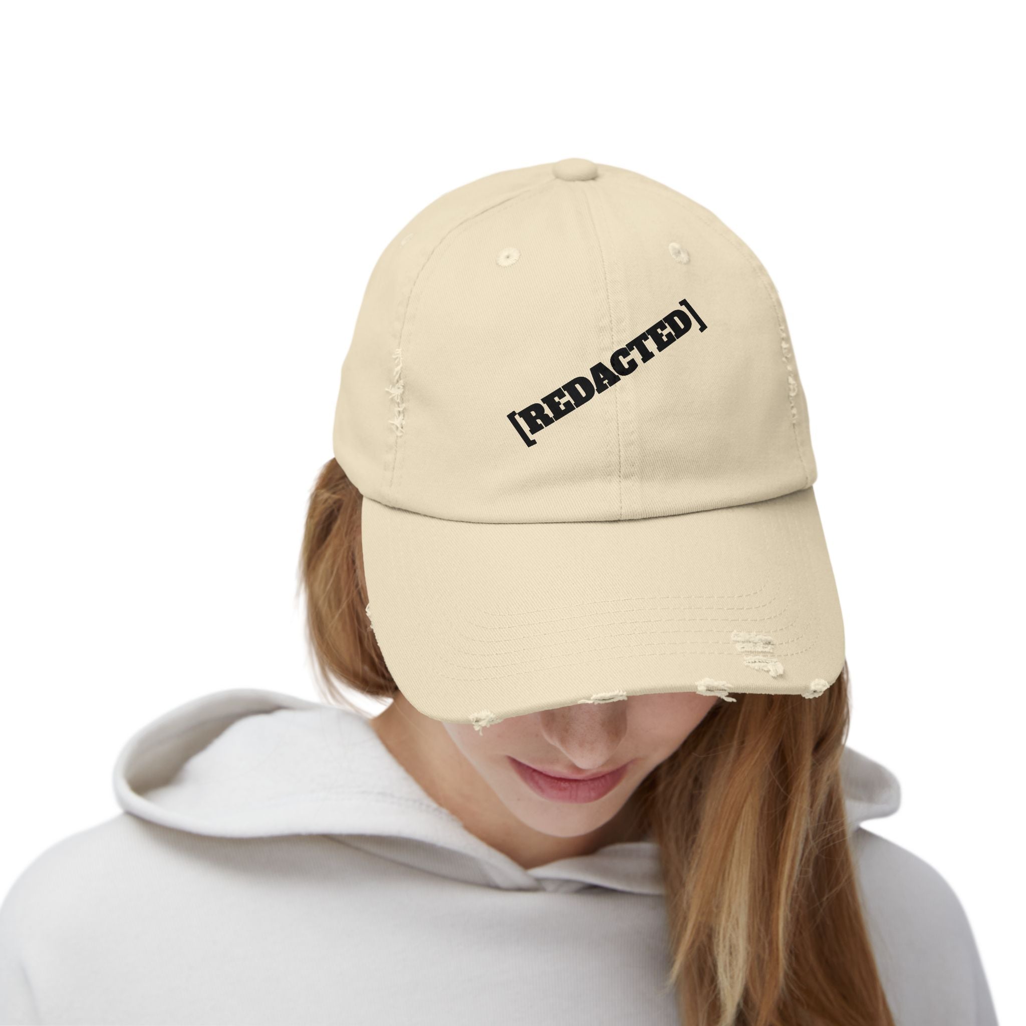 Model wearing tan [REDACTED] strap hat casual outfit