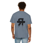 Person wearing a gray t-shirt with a black logo on the back, standing against a white background