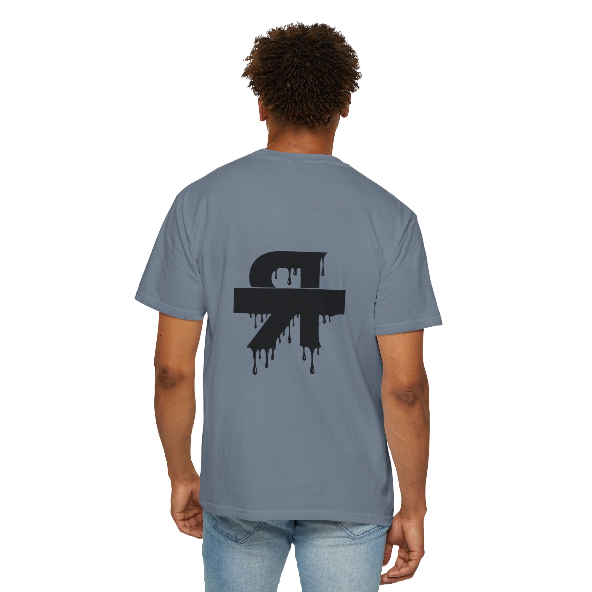 Person wearing a gray t-shirt with a black logo on the back, standing against a white background