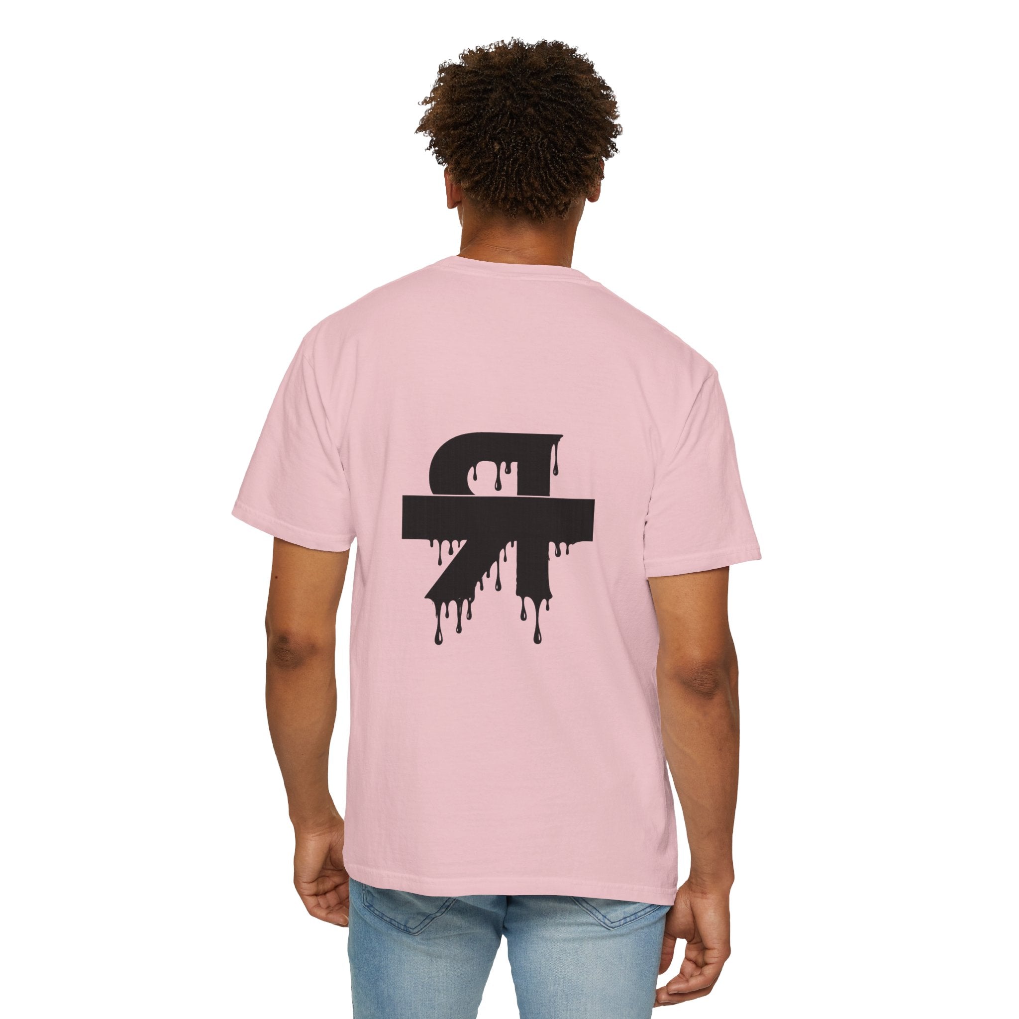 Person wearing a pink t-shirt with a black logo on the back, standing against a white background