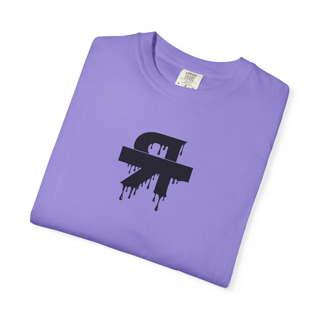 Folded purple t-shirt with a black symbol on a white background