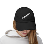 Model wearing black distressed [REDACTED] strapback hat streetwear style