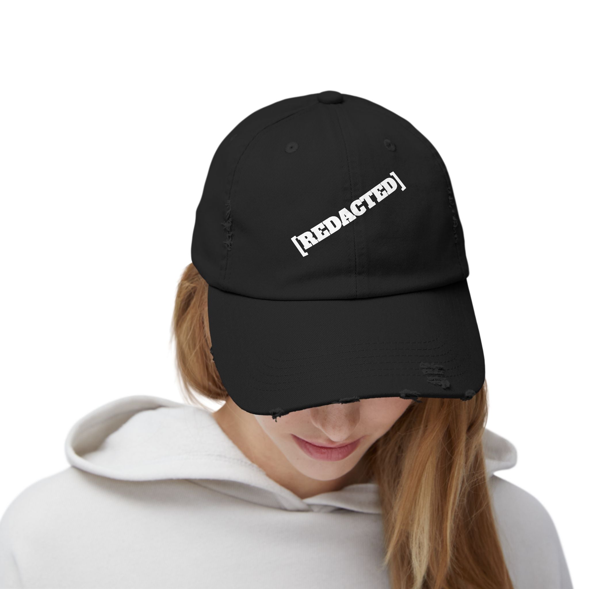 Model wearing black distressed [REDACTED] strapback hat streetwear style