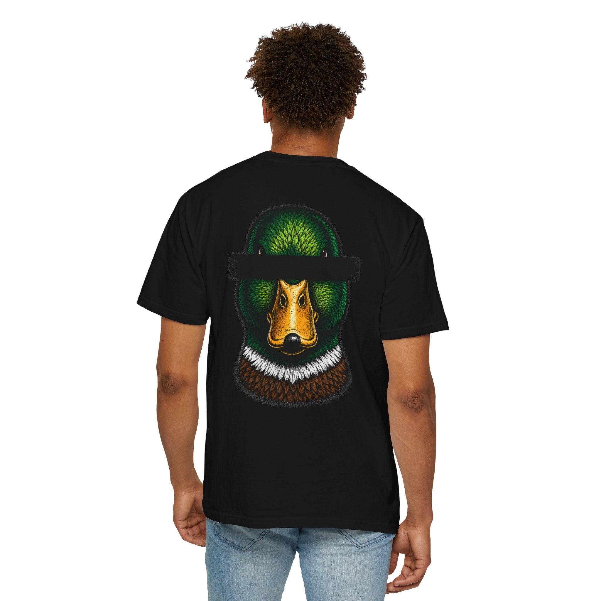Person wearing a black t-shirt with a colorful graphic on the back, standing against a white background