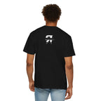 Model wearing black redacted shirt with bold white lettering and clean redaction bar design streetwear style back view