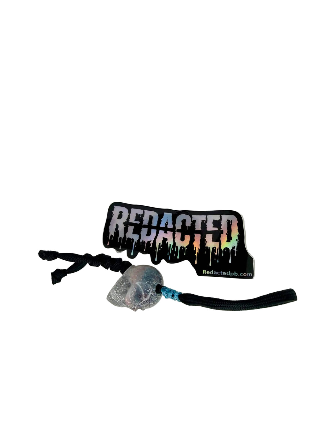 Handmade [REDACTED] frag tag with holographic redacted logo sticker on white background